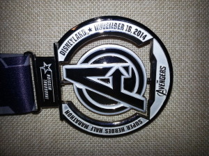 The race medal awarded to over 10,000 finishers from the first annual Avengers Half Marathon race at Disneyland.