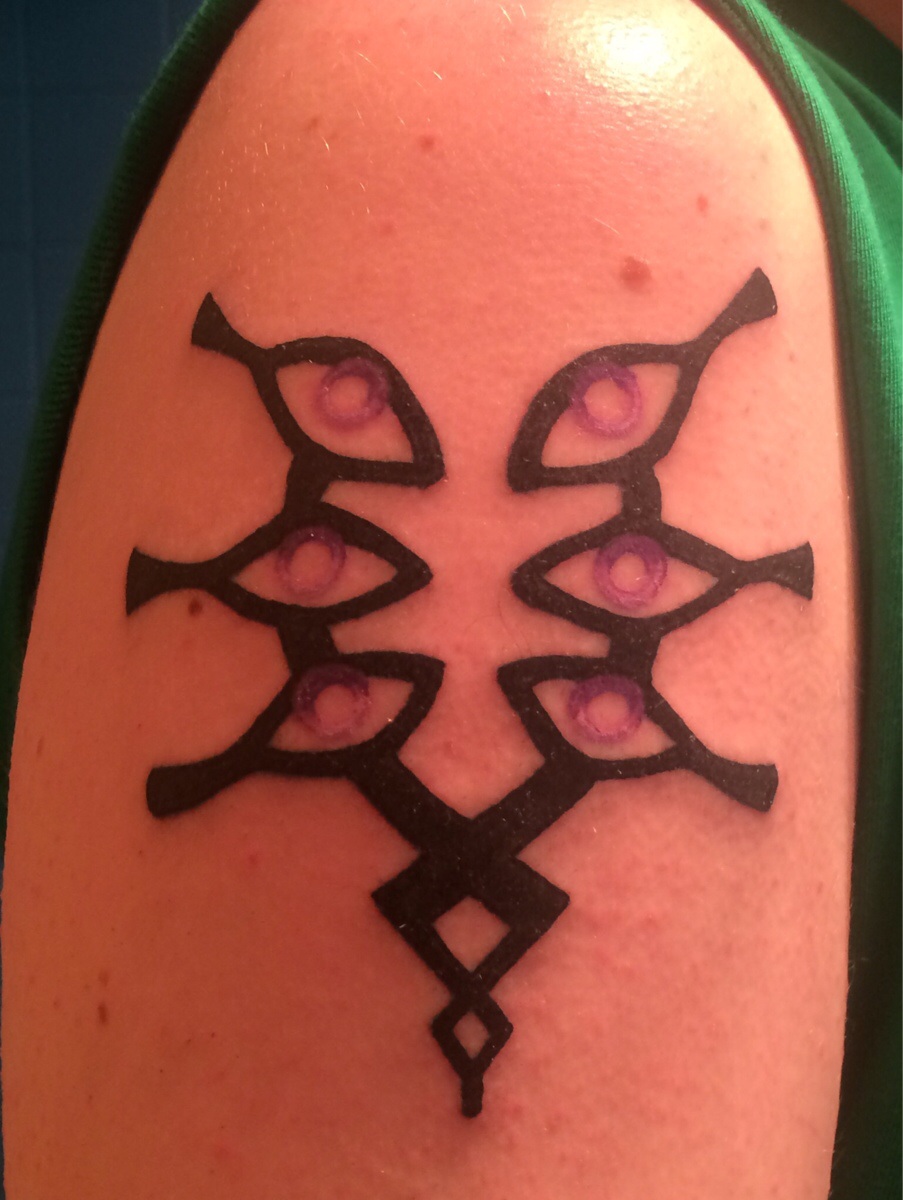 https://www.reddit.com/r/fireemblem/comments/2bqrgr/just_got_my_first_tattoo_today_my_mark_of_grima/